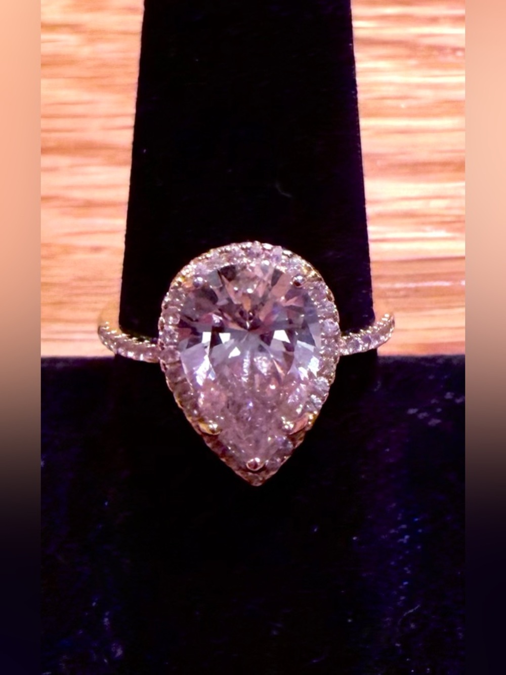 Pear-Shaped Pink Halo Solitaire Ring in Gold with Clear Stone